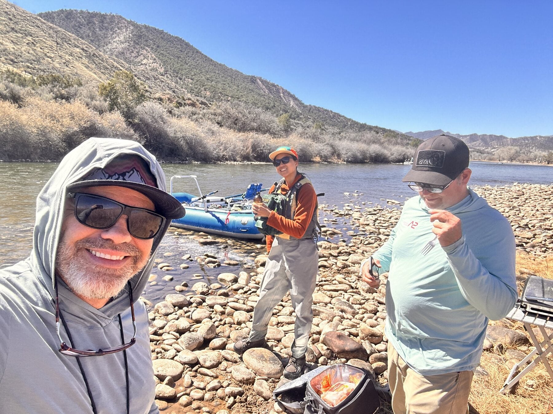 Three High Plains Drifters anglers sharing a break on the river